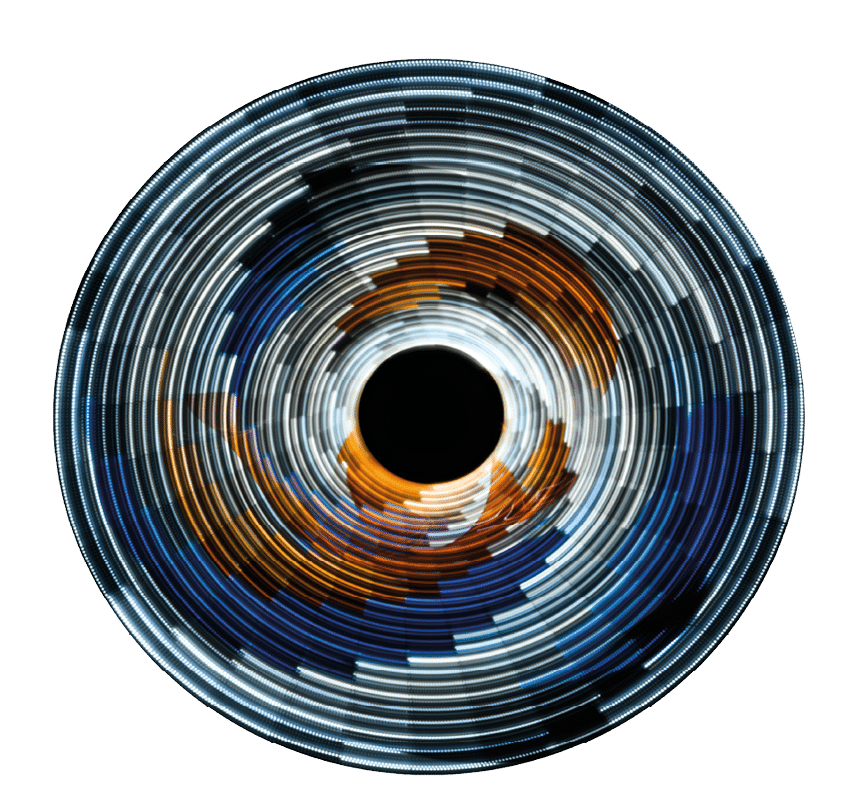 Abstract photo of a rotating soft colored swirl. Single long exposure of about 10 seconds. Abstract light painting artwork.